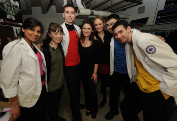 Several cast members celebrate backstage after In Vivo 2010